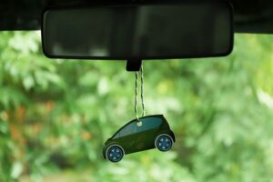 A car air freshener in the shape of a car used to keep the vehicle clean and smelling fresh throughout the summer in Springfield, IL.