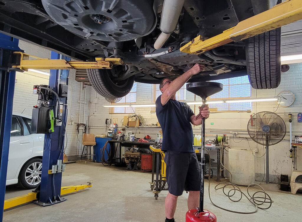 auto mechanic performing maintenance on a car springfield il