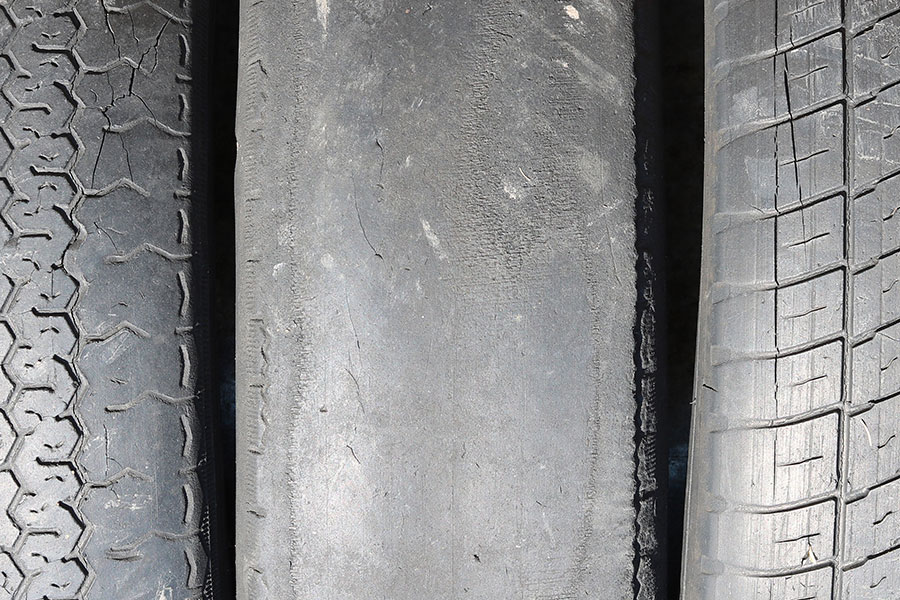 Signs of tire wear on a line of tires in Springfield, IL.