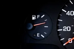 Jack Stoldt Auto Service – A vehicle in Springfield, IL, shows a fuel gauge just over half full, thanks to fuel-saving, eco-conscious driving habits.