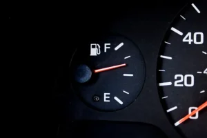 Jack Stoldt Auto Service – A vehicle in Springfield, IL, shows a fuel gauge just over half full, thanks to fuel-saving, eco-conscious driving habits.
